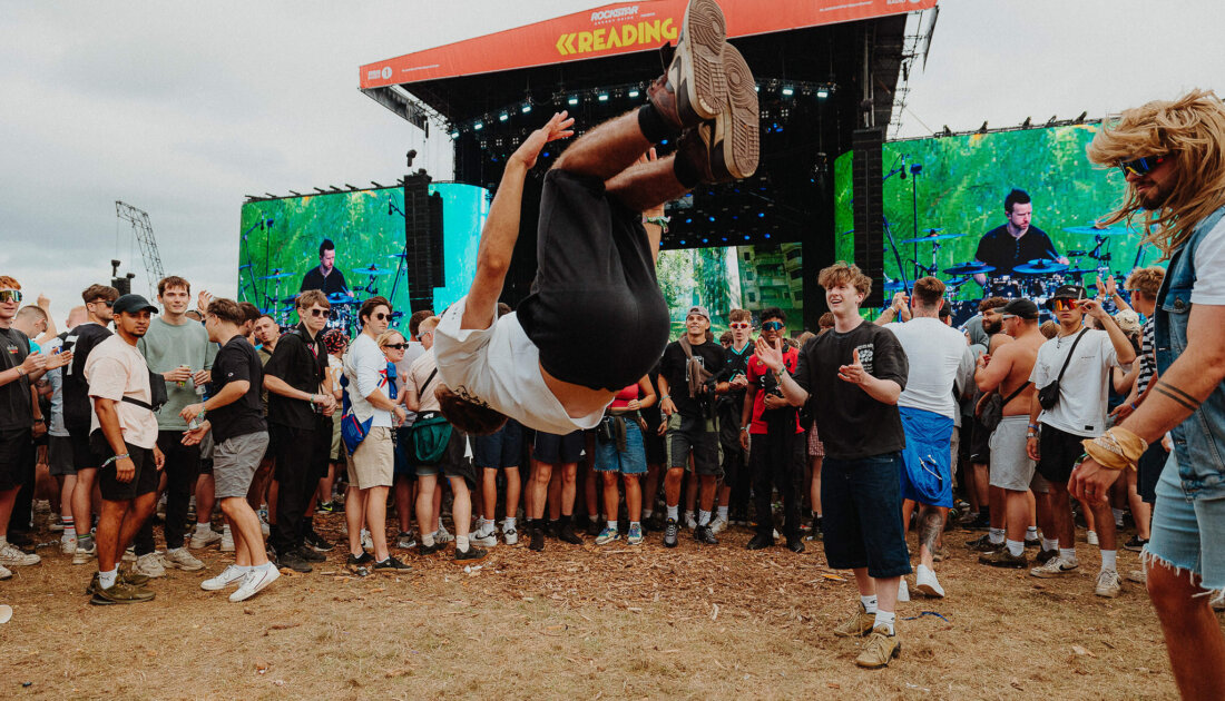 fan doing a backflip in middle of moshpit at Leeds festival 